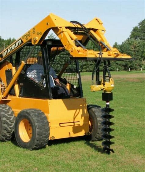 skid steer digging pictures|post hole digger for excavator.